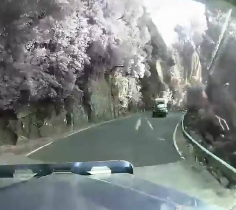 Move over: A screen grab from the truckie's dashcam showing an oncoming car in the middle of Macquarie Pass. Picture: supplied