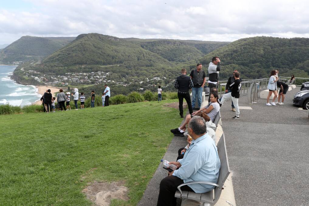 Too close: Bald Hill visitors not keeping their distance on Sunday afternoon. Picture: Robert Peet