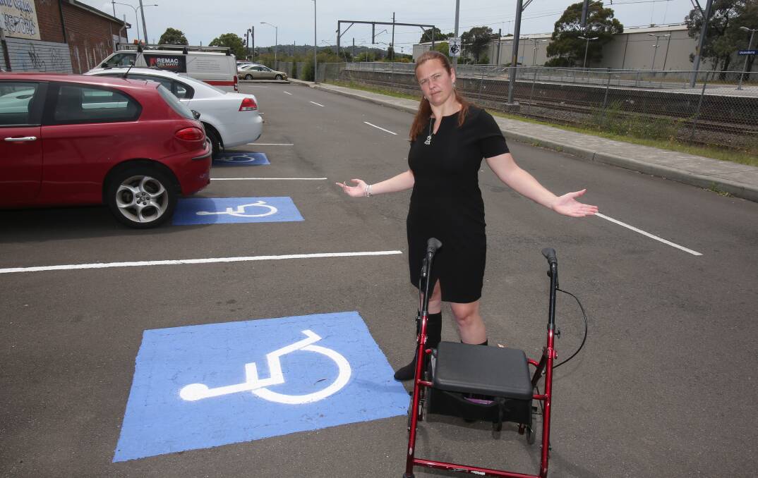 Unanderra Access Group member Bec Schmidt is surprised that an extra disabled parking space has been created at Unanderra station. Picture: Robert Peet