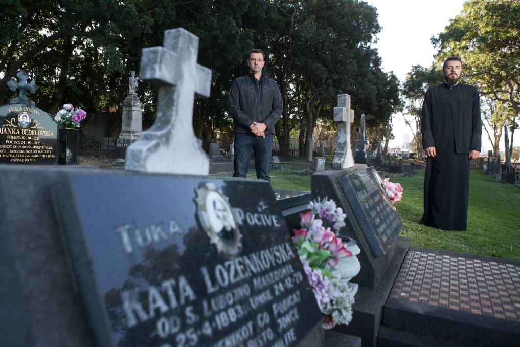 Macedonian Orthodox Community of Wollongong secretary Peter Lozenkovski and Father Robert Ilijevski understand the Wollongong City Council decision to close the cemeteries on a significant day in the Macedonian calendar. Picture: Adam McLean