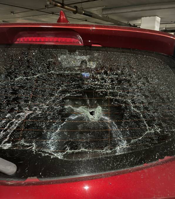 Damage: The shattered rear window of Laura Fairall's Mazda. Picture: Laura Fairall