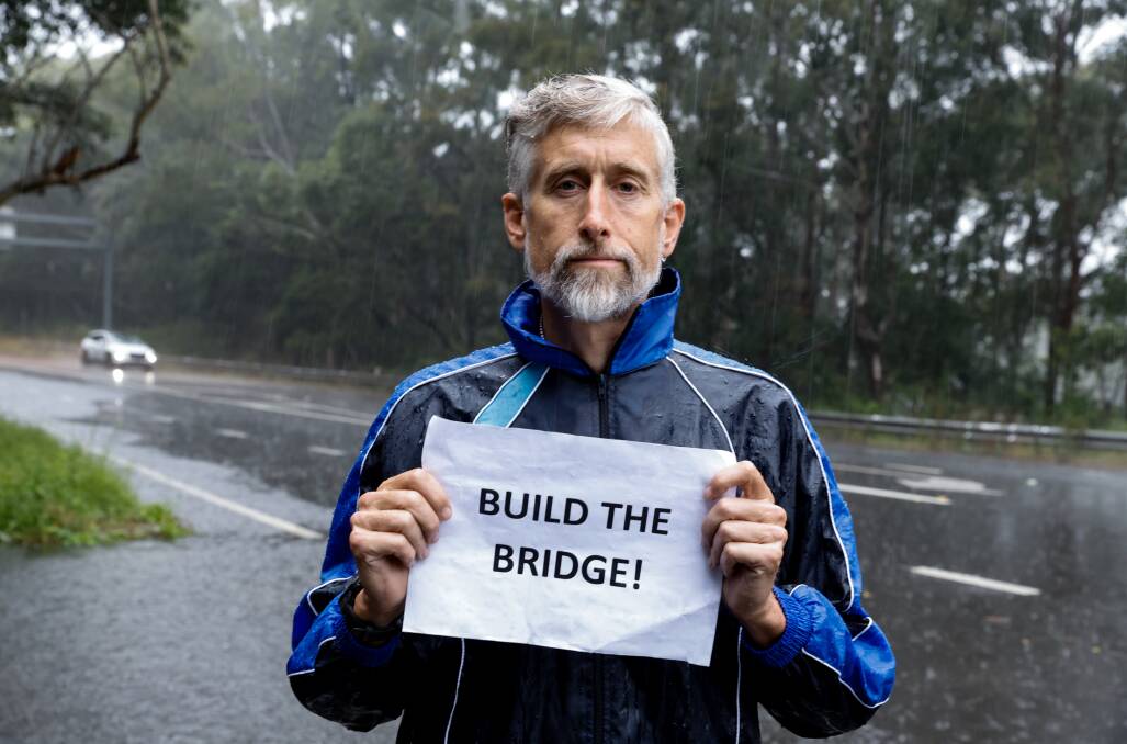 Illawarra Bicycle Users Group president Ed Birt is pushing back against plans to scrap a pedestrian bridge on the Mt Ousley interchange. Wollongong City Council has also voiced its opposition to the move. Picture by Anna Warr