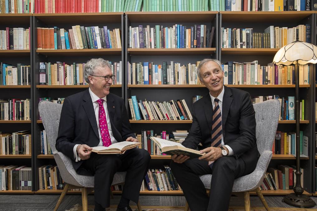 University of Wollongong Vice-Chancellor Professor Paul Wellings and Ramsay Centre CEO Professor Simon Haines are all smiles after signing a deal to provide a new degree on Western civilisation. Picture: supplied