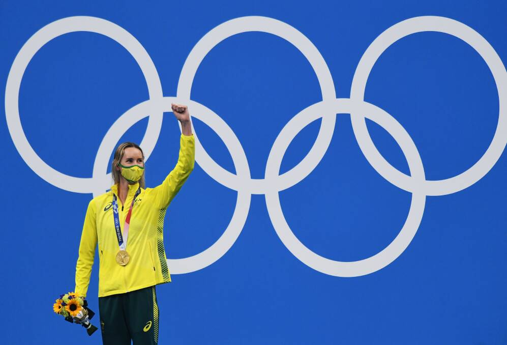 Champion: Wollongong swimmer Emma McKeon on the dais accepting one of her four Olympic gold medals. Picture AAP