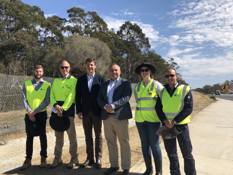 Up to speed: Federal Hume MP Angus Taylor and state Wollondilly MP Jai Rowell (centre) at the site of the new Picton Road accelerating lanes. Picture: supplied