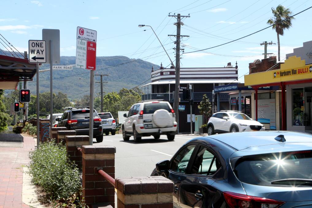 Plans to eliminate a right-turn into Station Street will see all eastbound traffic along the Princes Highway at Bulli forced to use the one intersection. Picture: Sylvia Liber