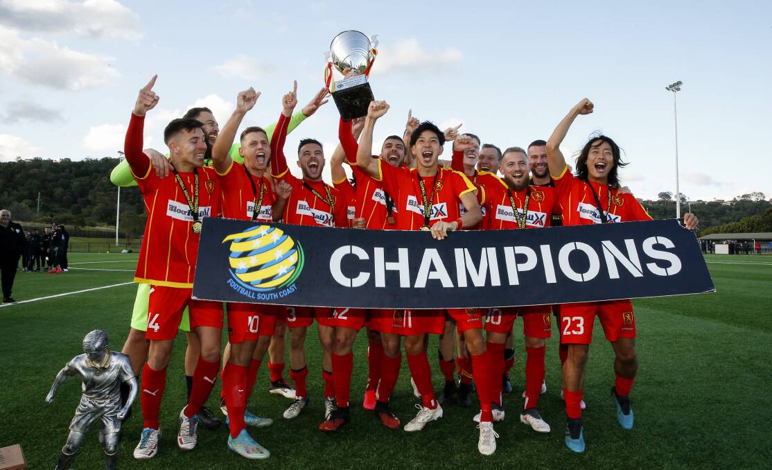 ON TOP: Wollongong United players celebrate after winning the Illawarra Premier League premiership on Sunday. Picture: Anna Warr