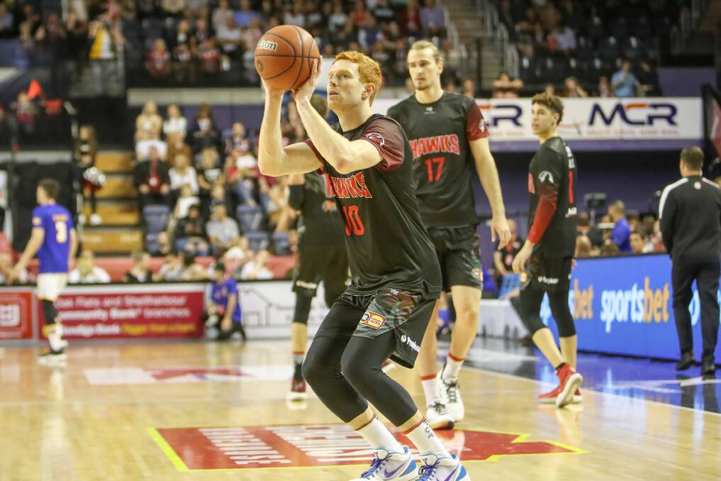 ON TARGET: Angus Glover lines up a shot ahead of a game against the Brisbane Bullets last month. Picture: Adam McLean 