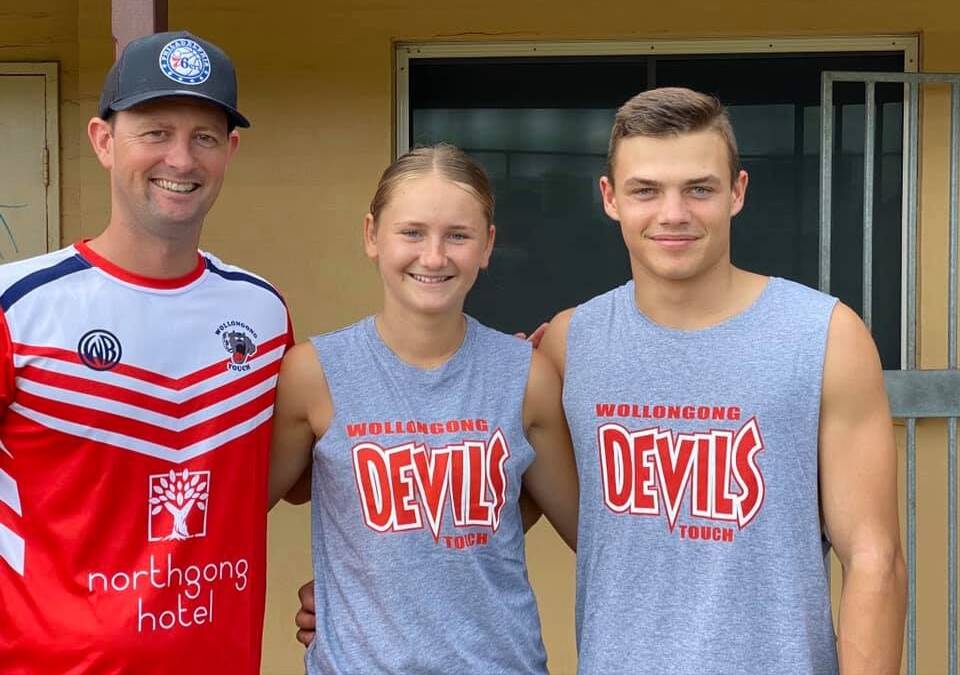 LEADERS: Wollongong Devils vice-president Tim Robinson congratules club captains Mackenzie Ford and Corey Bamford.
