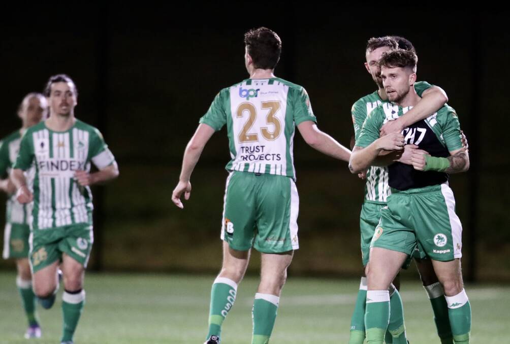 TEAMWORK: Green Gully players celebrate after Alex Salmon scored in the first half. Picture: Adam McLean