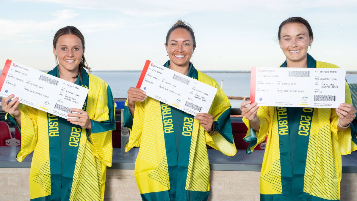 Hayley Raso, Kyah Simon and Caitlin Foord with their boarding passes for the Tokyo Olympics. Picture: Matildas
