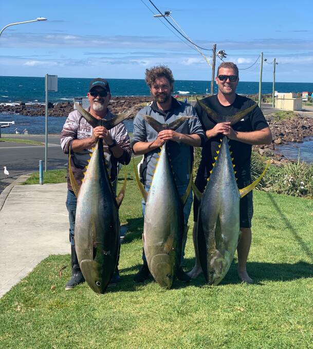 TRIPLE THREAT: Joe Soto, Henrick Dux and Cliff Cole with their stick bait-caught tuna from last Monday.