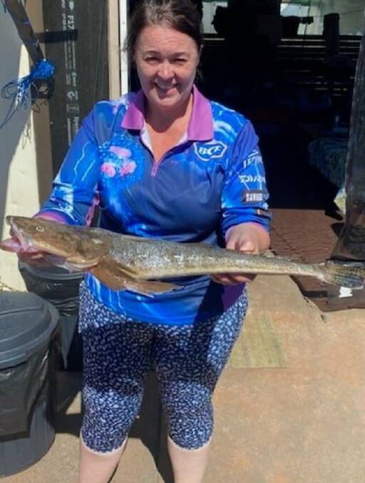 Catchy: Janine Donaldson with her 67-centimetre flatty from the Basin.