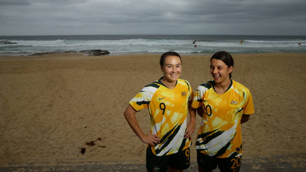 Caitlin Foord, pictured with fellow Matildas star Sam Kerr in 2020, continues to make her mark on the international game. Picture by Jonathan Carroll/Newcastle Herald
