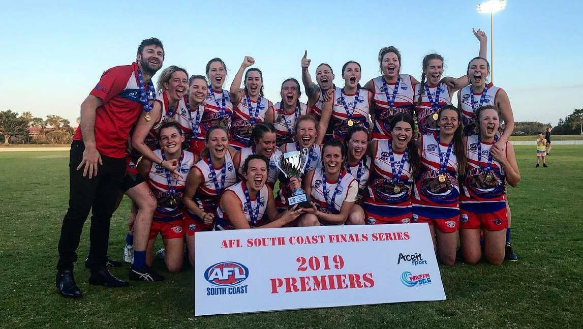 The Wollongong Bulldogs celebrate after winning last year's AFL South Coast Women's Premier Division title. Picture: AFL South Coast