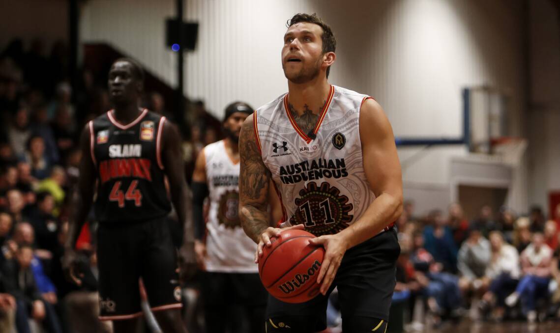 PROUD: Former Hawk Tyson Demos in action for the Indigenous All-Stars last September in Wollongong. Picture: Anna Warr