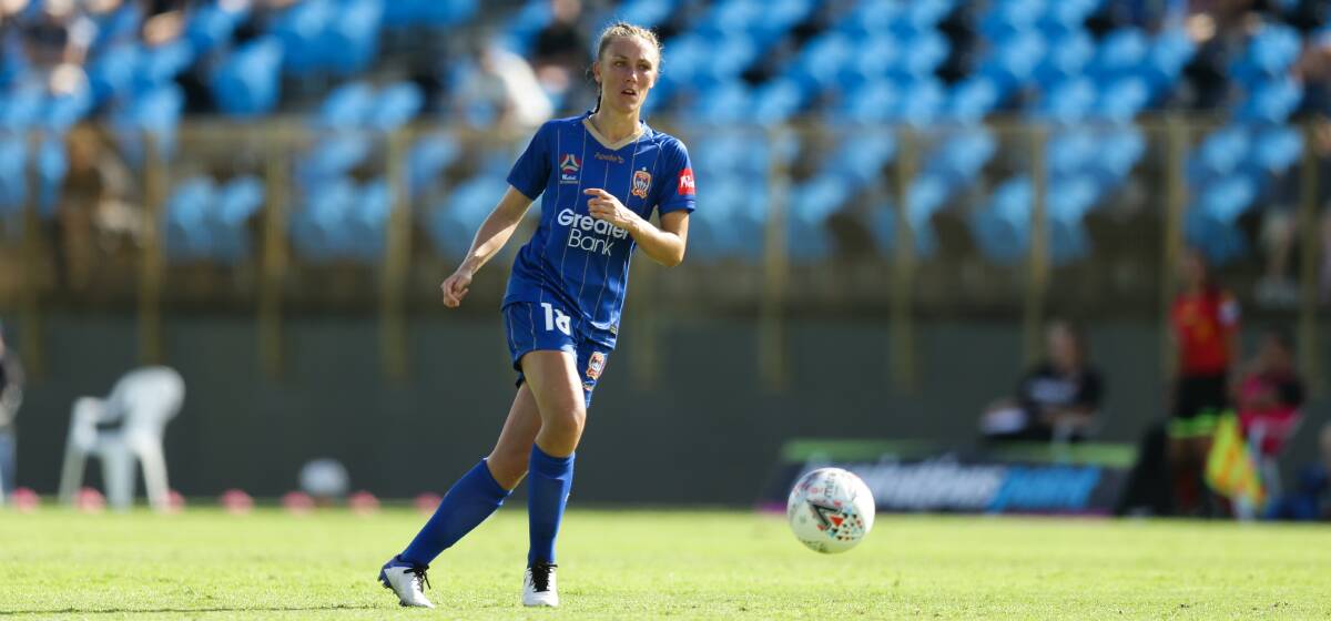 MOVING FORWARD: Shellharbour's Taren King controls possession for the Jets during a W-League game against Melbourne Victory in Newcastle earlier this year. Picture: Jonathan Carroll
