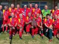 DELIGHT: The Illawarra team celebrate after winning the NSW State Over 55 veteran hockey championships.