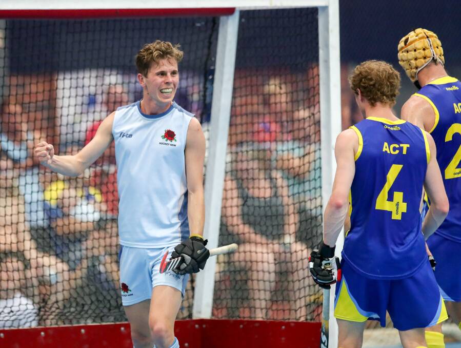 DELIGHTED: South Coast's Callum Mackay celebrates after scoring a goal in Tuesday's open men's grand final. Picture: Adam McLean