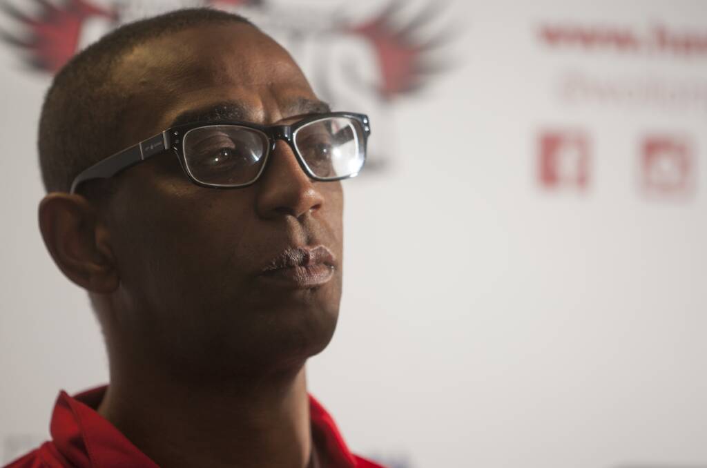 PONDERING: Hawks assistant coach Eric Cooks. Picture: Christoper Chan