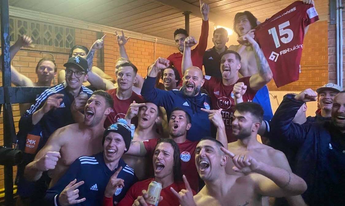 Albion Park players start to celebrate after claiming this year's Illawarra Premier League premiership on Saturday. Picture by Nick Cryssos