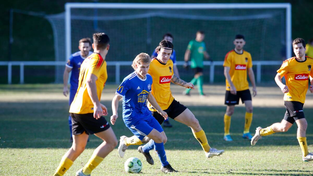 Bulli player Deakin Brownlee controls possession during a recent game against Coniston. Picture by Anna Warr