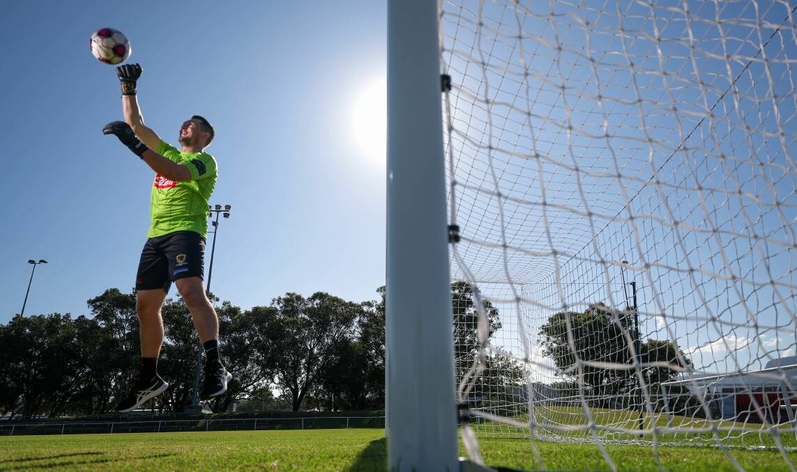 Blake Horton jumps up to punch the ball away while practising at JJ Kelly Park. Picture by Adam McLean