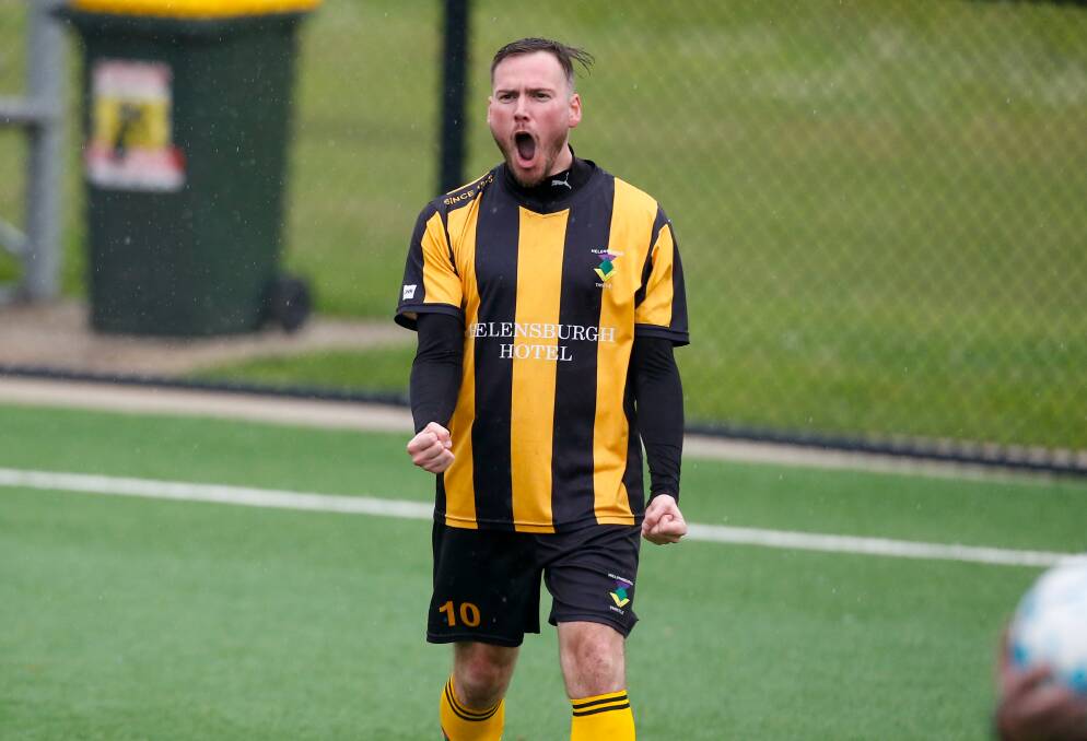 Brad Watts celebrates after scoring a goal for Helensburgh in their major semi-final this year against Unanderra. Picture by Anna Warr