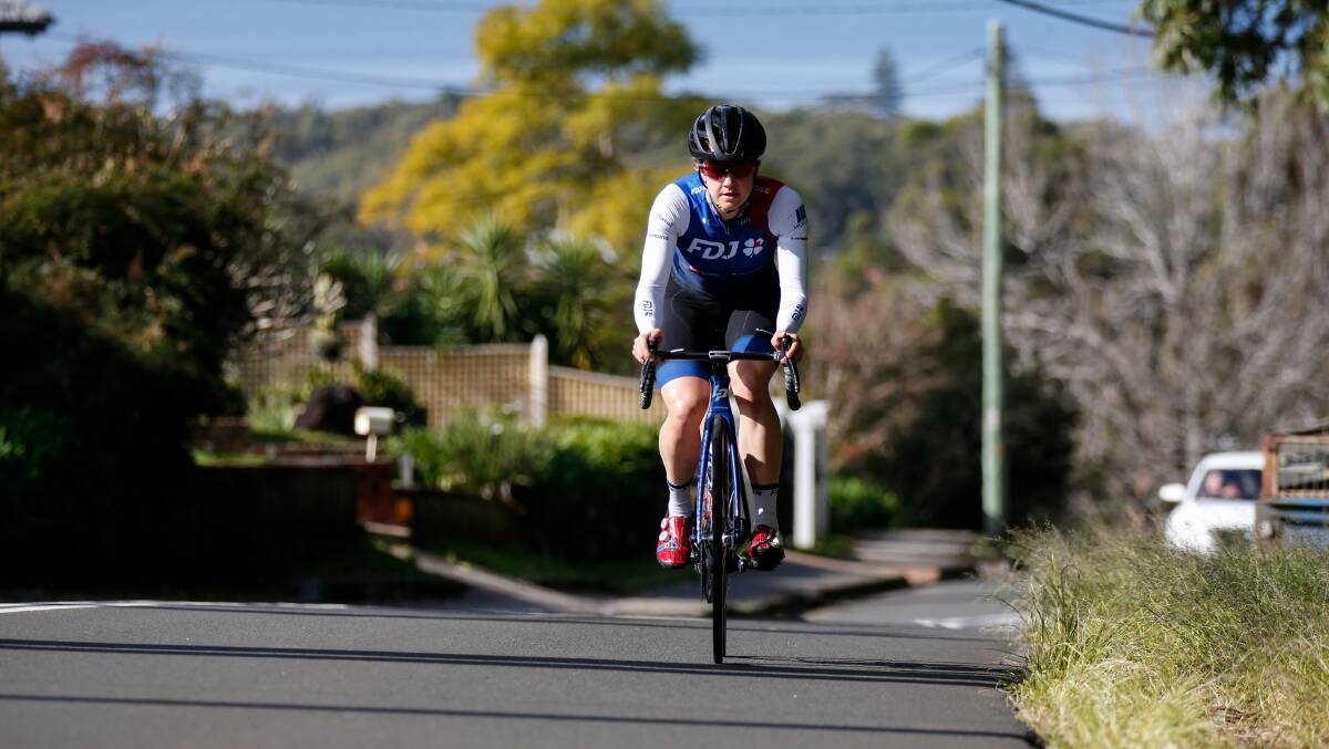 POWERING AHEAD: Olympian Grace Brown rides up Dumphries Avenue in Mount Ousley. Picture: Anna Warr
