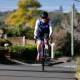 POWERING AHEAD: Olympian Grace Brown rides up Dumphries Avenue in Mount Ousley. Picture: Anna Warr