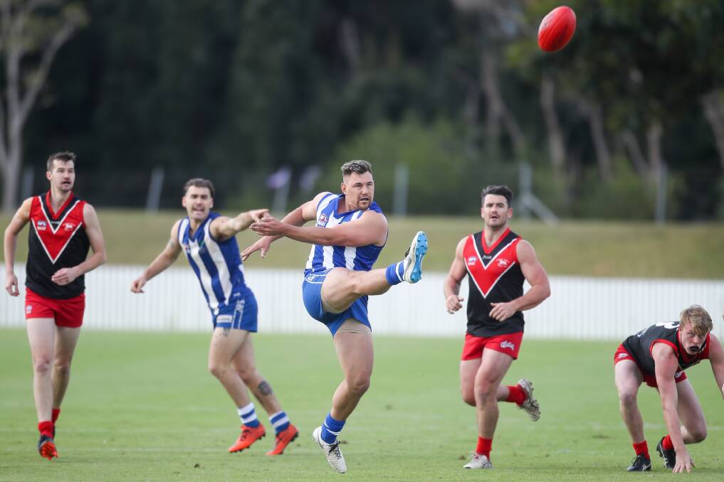 ON TARGET: Figtree's Ben Yakimov snaps a goal against the Wollongong Lions at North Dalton Park last year. Picture: Adam McLean