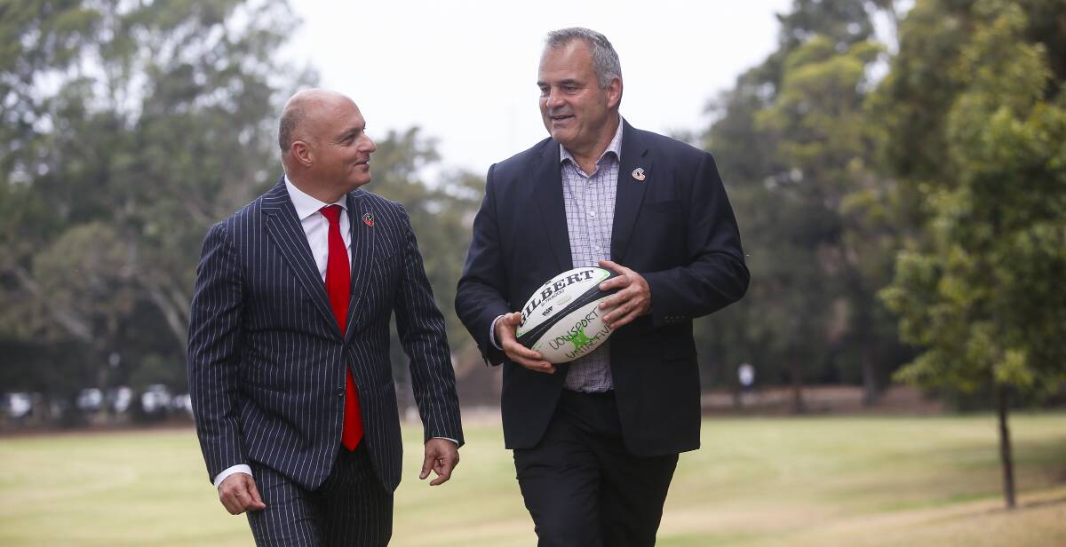 TEAMWORK: University of Wollongong's Deputy Vice-Chancellor, Global Strategy, Professor Alex Frino chats rugby with Crusaders CEO Colin Mansbridge on Thursday. Picture: Anna Warr