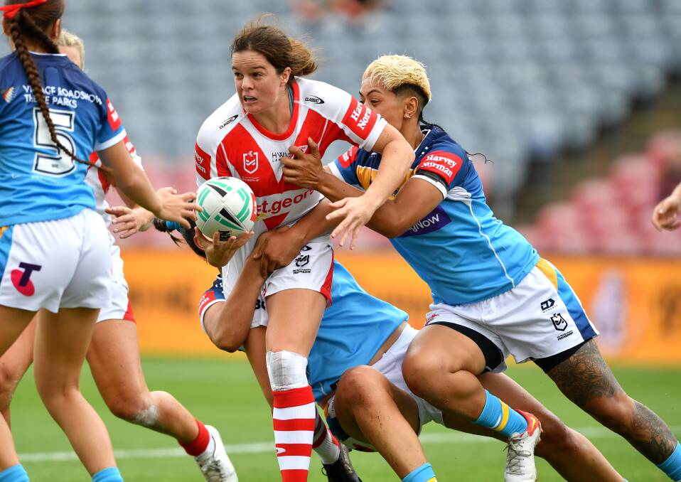 Rachael Pearson prepares to pass the ball to a St George Illawarra teammate. Picture: Dragons Media