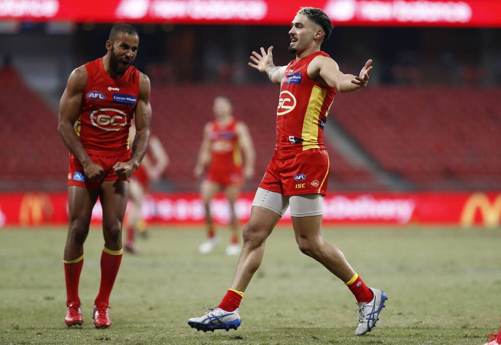 ENTERTAINER: Izak Rankine (right) was superb on his AFL debut for the Gold Coast Suns on Saturday night. Picture: Ryan Pierse/Getty Images