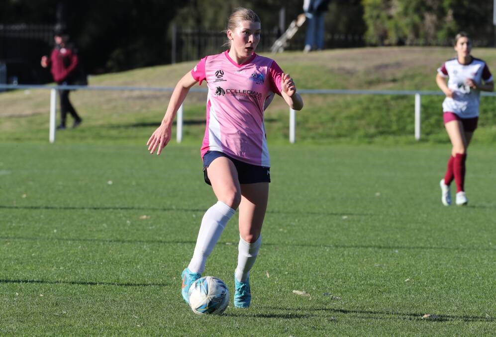 Halle Kirsty Hallow runs the ball forward during a game for the Stingrays earlier this NSW Women's NPL season. Picture by Robert Peet