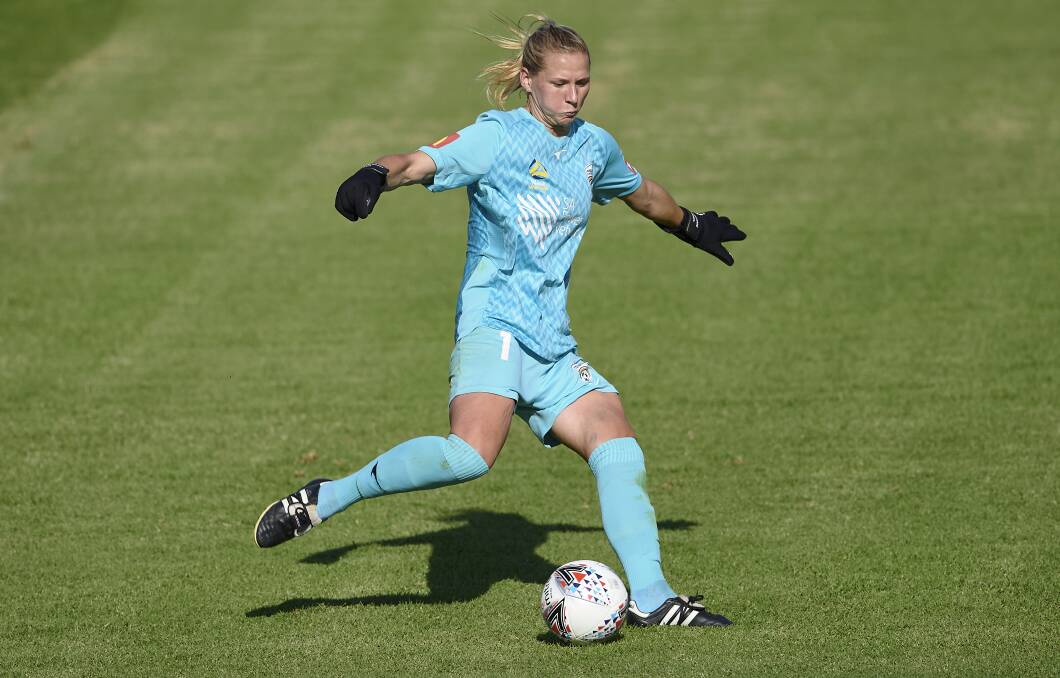 MOVING FORWARD: Goalkeeper Sian McLaren controls the ball for Adelaide United during a W-League game in February. Picture: Brett Hemmings/Getty Images