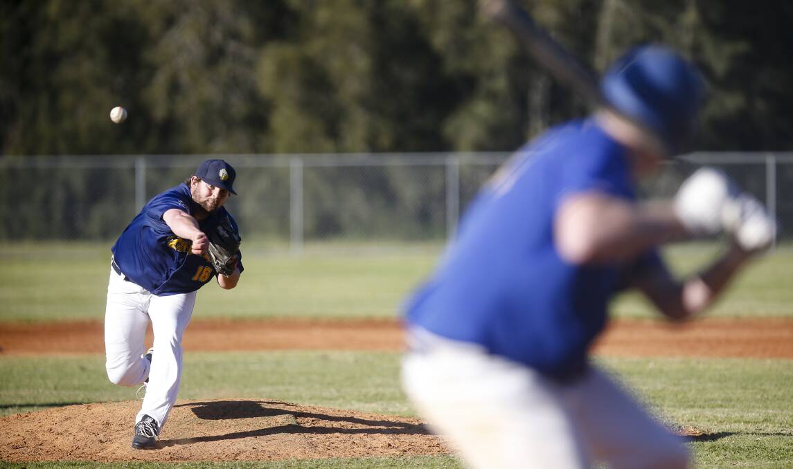 ACTION: Brad Simon pitching for the Chiefs. Picture: Anna Warr
