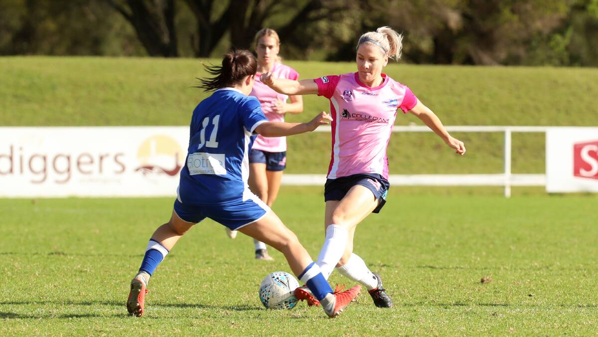 NO SHOW: Caitlin Cooper (right) is one of several Stingrays unavailable to play on Sunday due to W-League commitments. Picture: Sylvia Liber