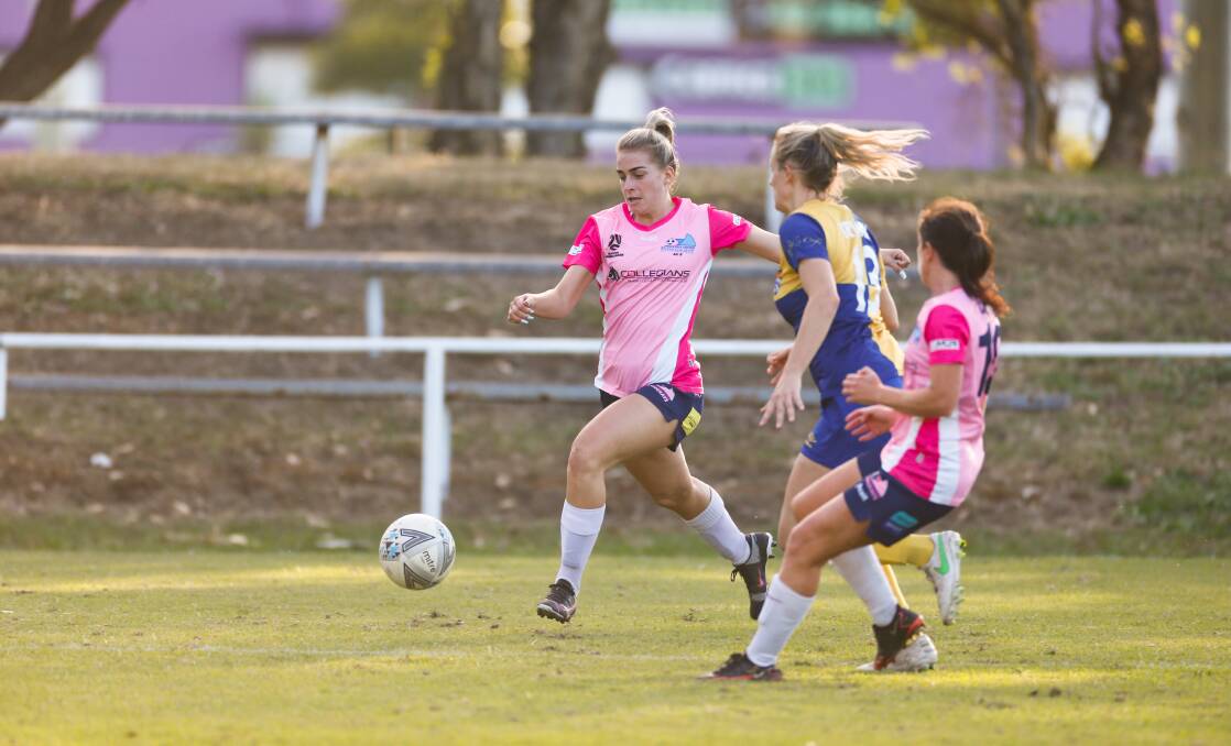 PURSUIT: Danika Matos leads the chase to the ball. Picture: Anna Warr