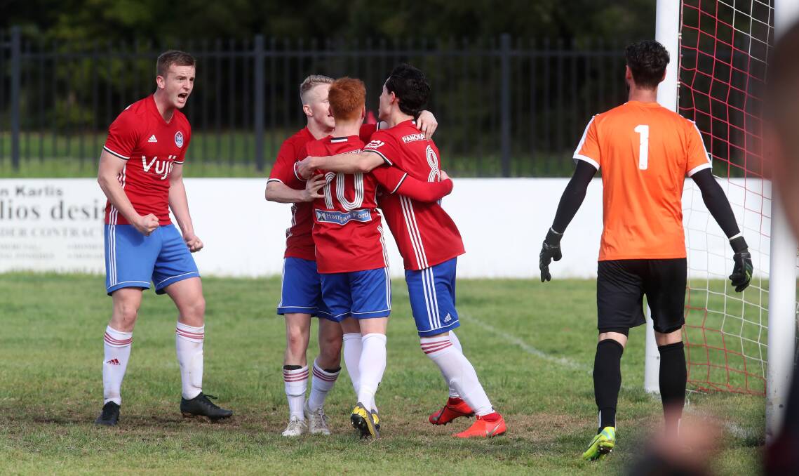 Action from Albion Park's win over Wollongong Olympic in the Illawarra Premier League at Terry Reserve on Sunday. Pictures: Sylvia Liber