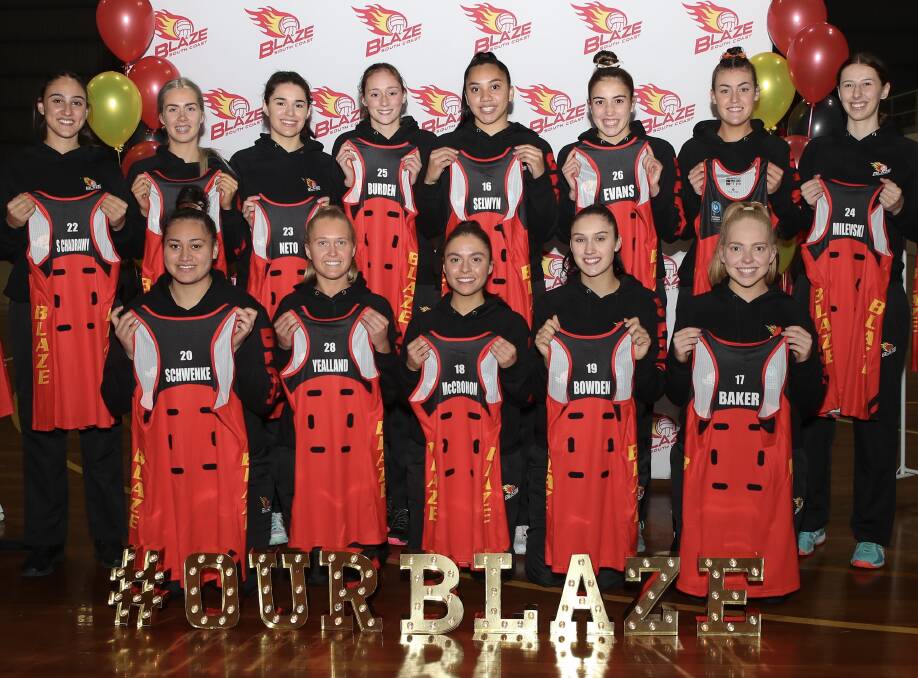 GREAT START: South Coast Blaze's under 23s players hold up their uniforms at this week's dress presentation. Picture: May Bailey