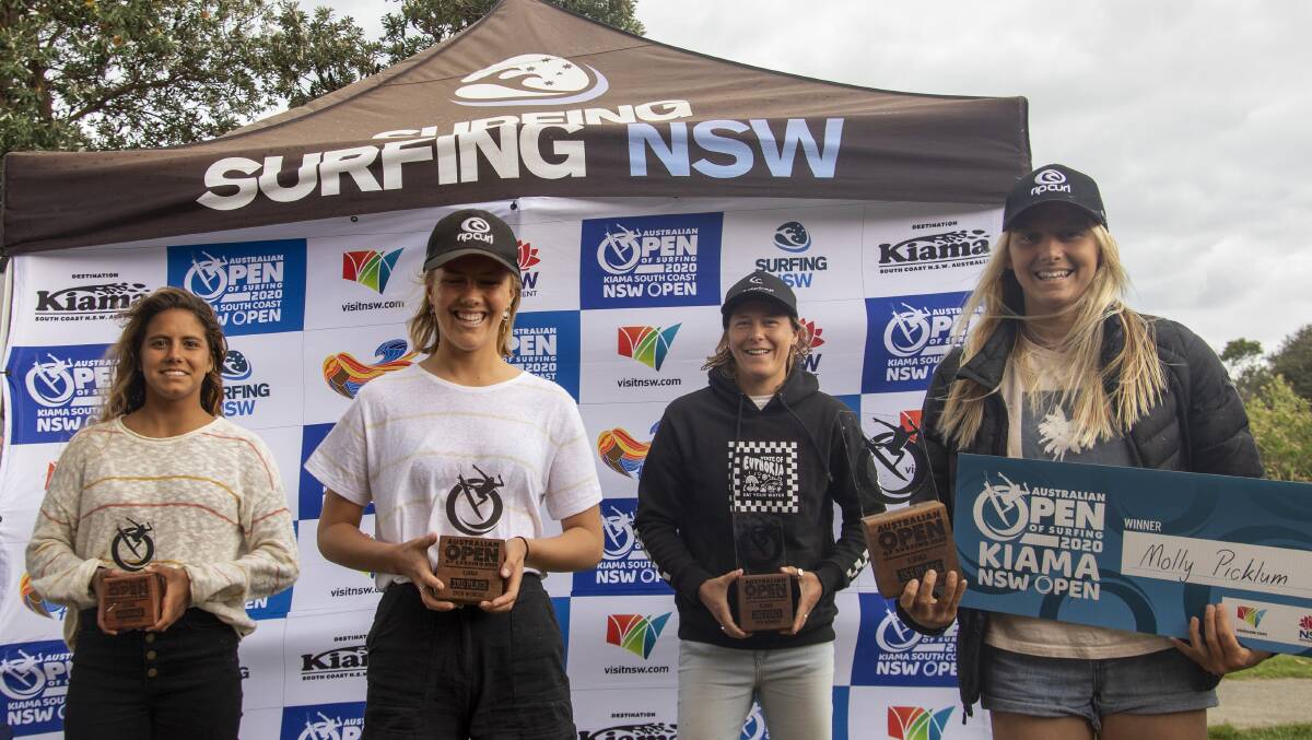 DELIGHT: Shelly Beach surfer Molly Picklum (right) celebrates her Kiama Open win with her fellow open women's finalists on Monday. Picture: Ethan Smith/Surfing NSW