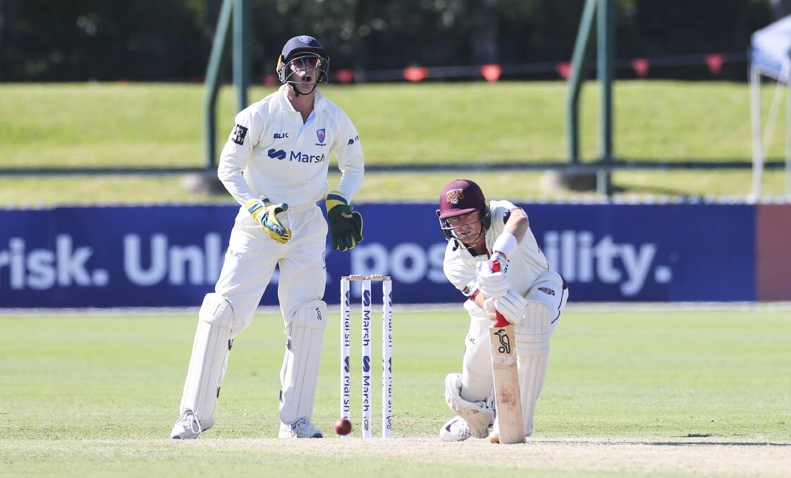 Queensland batsman Marnus Labuschagne defends a ball from NSW spinner Nathan Lyon at North Dalton Park. Picture: Anna Warr