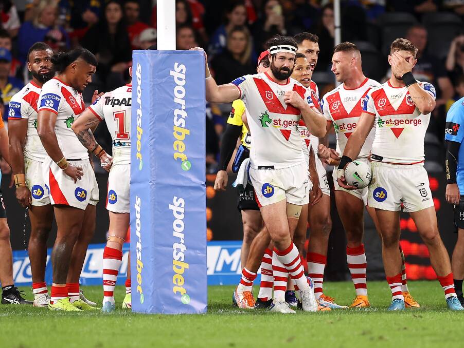 FRUSTRATED: Aaron Woods and his teammates look dejected after conceding a try against the Eels in round four. Picture: Mark Kolbe/Getty Images