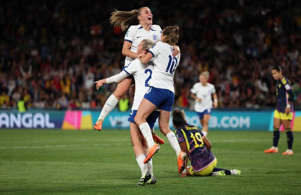 England's Alessia Russo (left) celebrates with Georgia Stanway (top) and Ella Toone after scoring their side's second goal against Colombia in Sydney on Saturday night. Picture - Getty Images