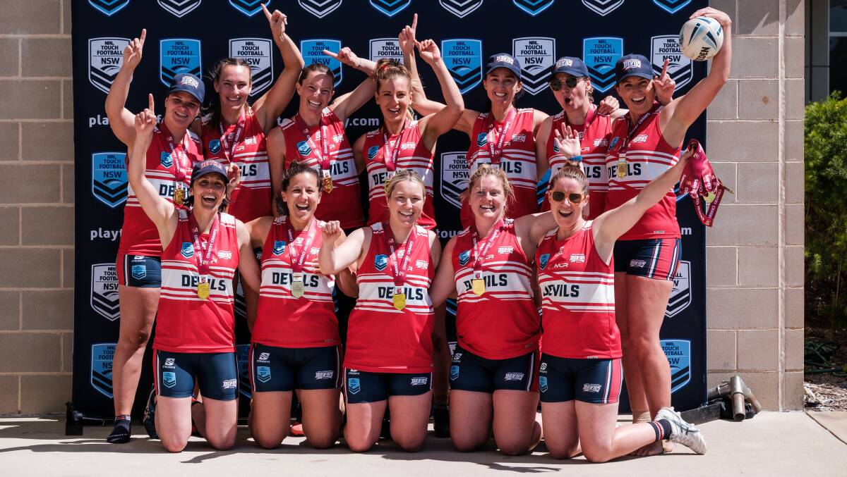 Wollongong Touch Association's women's 30s team celebrates after prevailing at the NSW Country Championships last weekend. Picture - NSW Touch