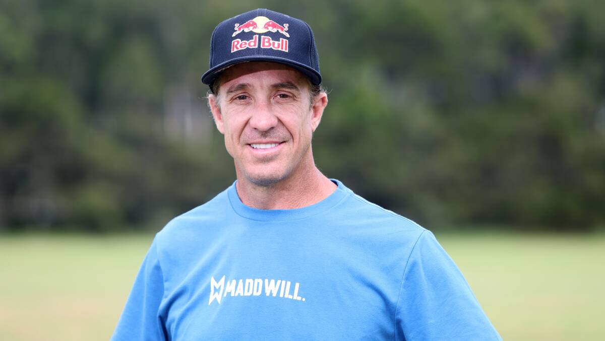 Australian motocross legend Robbie Maddison relaxing at Stuart Park on Wednesday. Picture by Sylvia Liber