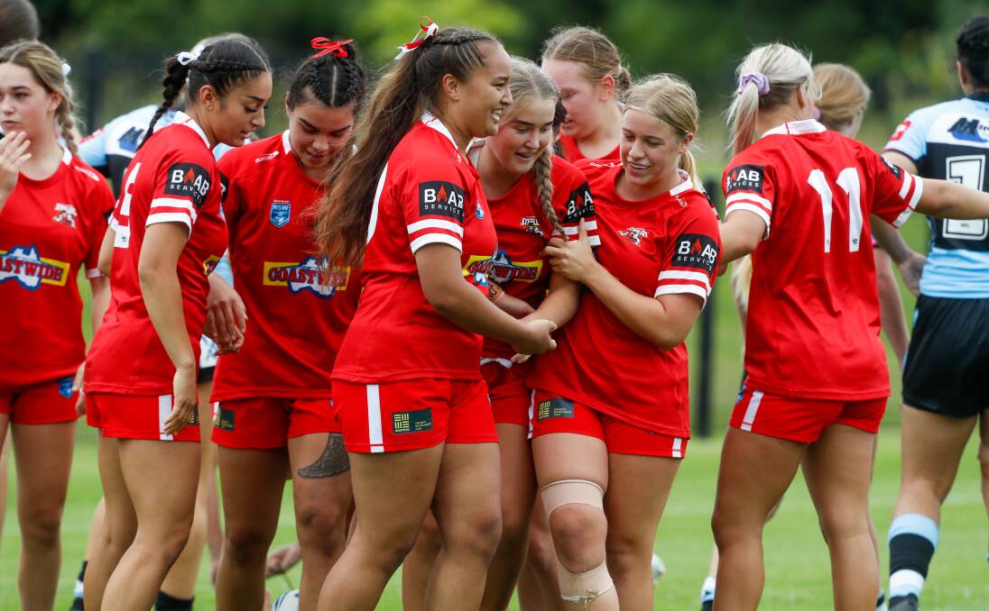 HAPPY DAYS: The Steelers Tarsha Gale side celebrate after five-eighth Lily Rogan scored a try against the Sharks at Collegians Sporting Complex on Saturday. Picture: Adam McLean