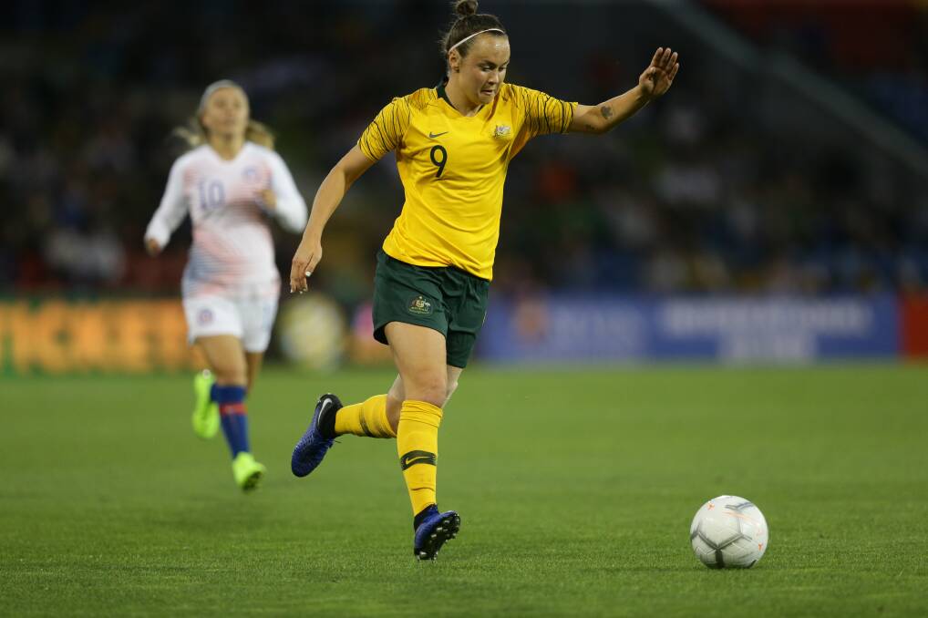 ON THE BALL: Caitlin Foord looks to pass to a Matildas teammate during a game against Chile in Newcastle in November, 2018. Picture: Jonathan Carroll