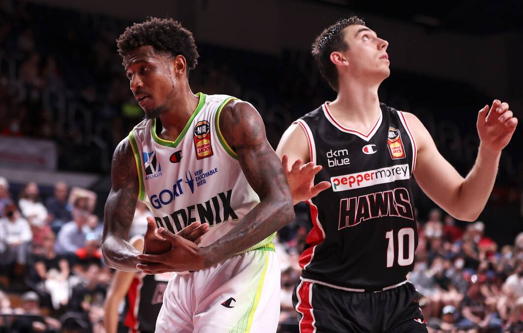 South East Melbourne's Xavier Munford celebrates after scoring a basket against the Hawks in Wollongong on Monday night. Picture: Mark Kolbe/Getty Images
